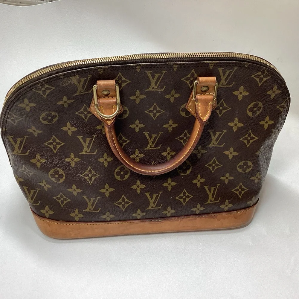 Louis Vuitton Monogram Alma Handbag Brown Coated Canvas Leather